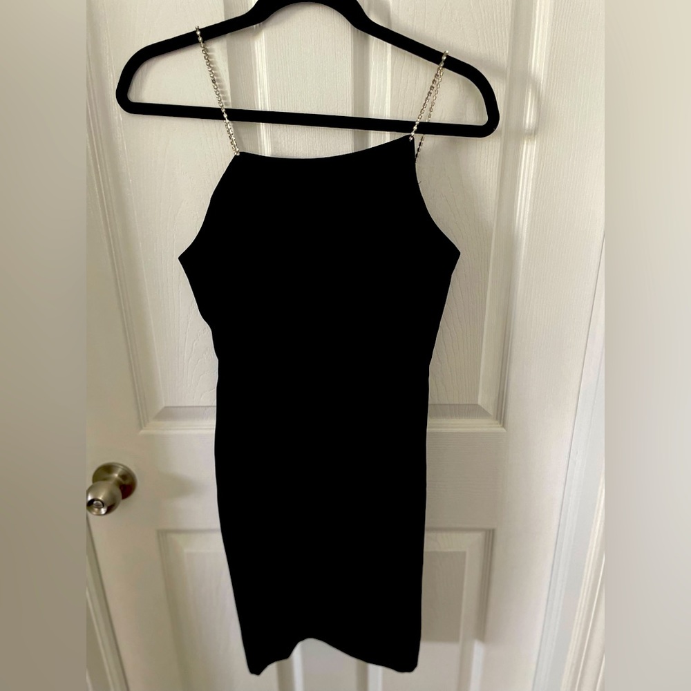 Jewel spaghetti strap asymmetrical neckline little black dress